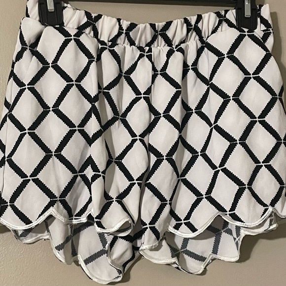 mine Pants - Women’s black and white fashion shorts.